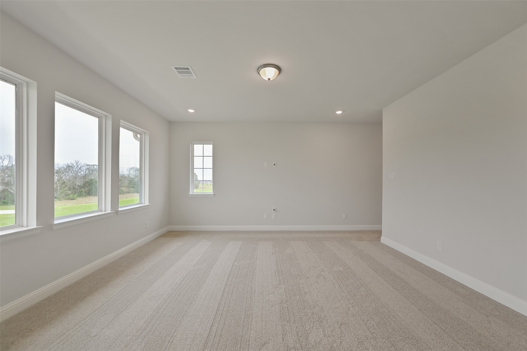 5215 Conifer Court Manvel, TX 77578 - Photo 27 of 49 a view of an empty room with a window