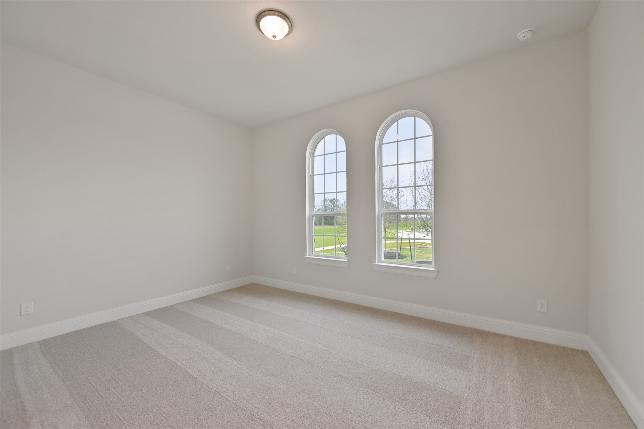 5215 Conifer Court Manvel, TX 77578 - Photo 40 of 49 an empty room with windows and mirror