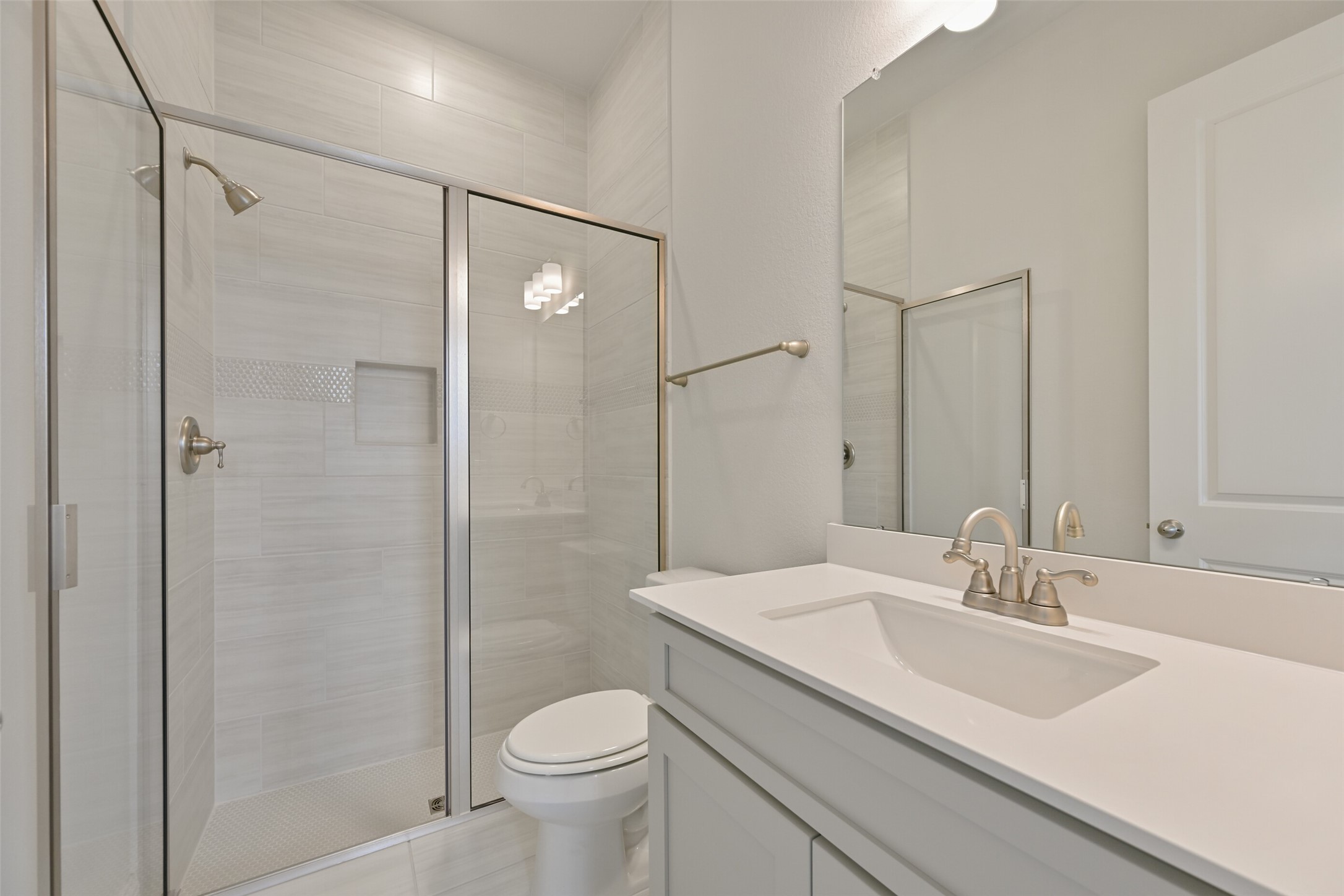 5215 Conifer Court Manvel, TX 77578 - Photo 42 of 49 a bathroom with a sink toilet and shower