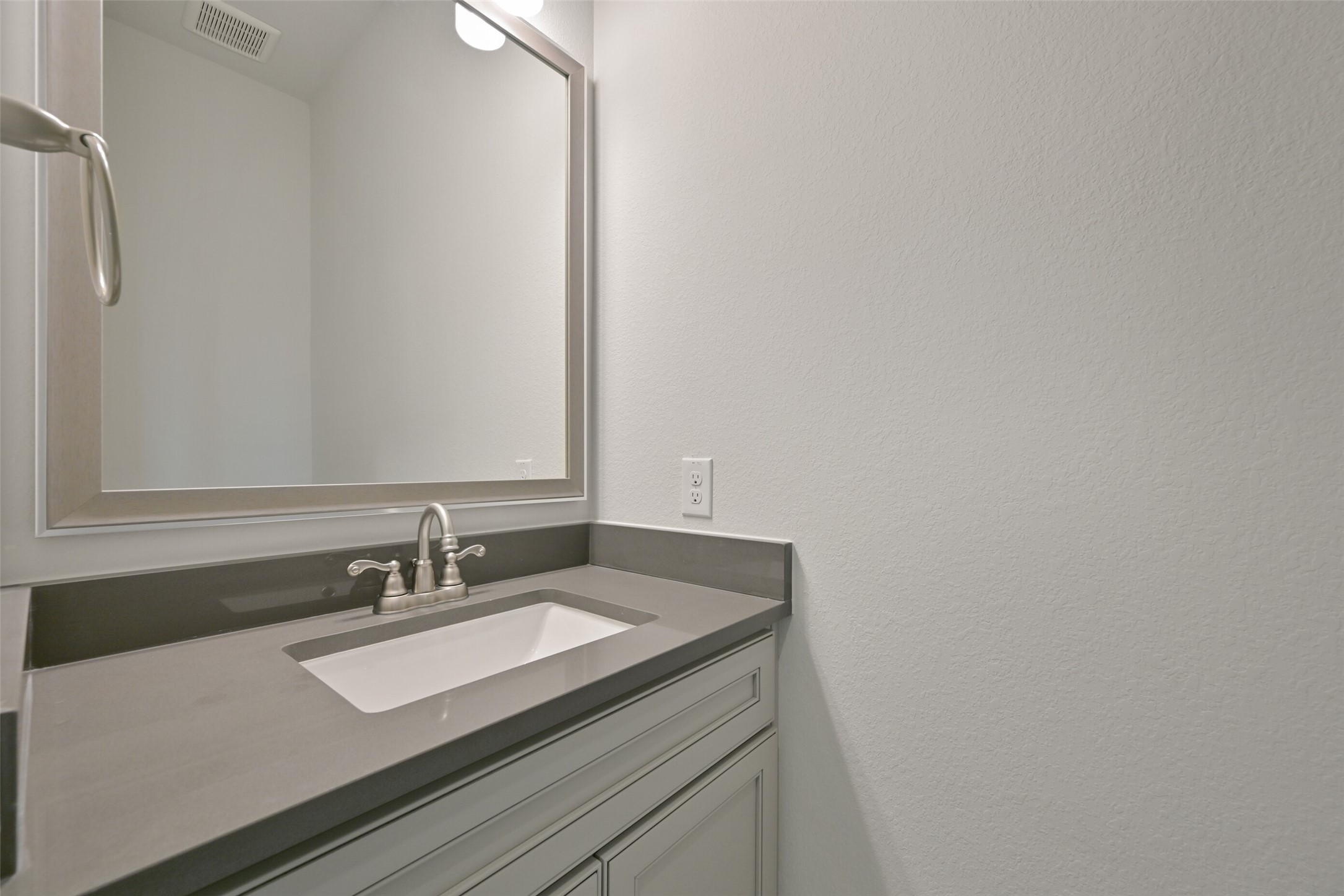 5215 Conifer Court Manvel, TX 77578 - Photo 43 of 49 a bathroom with a sink and a mirror
