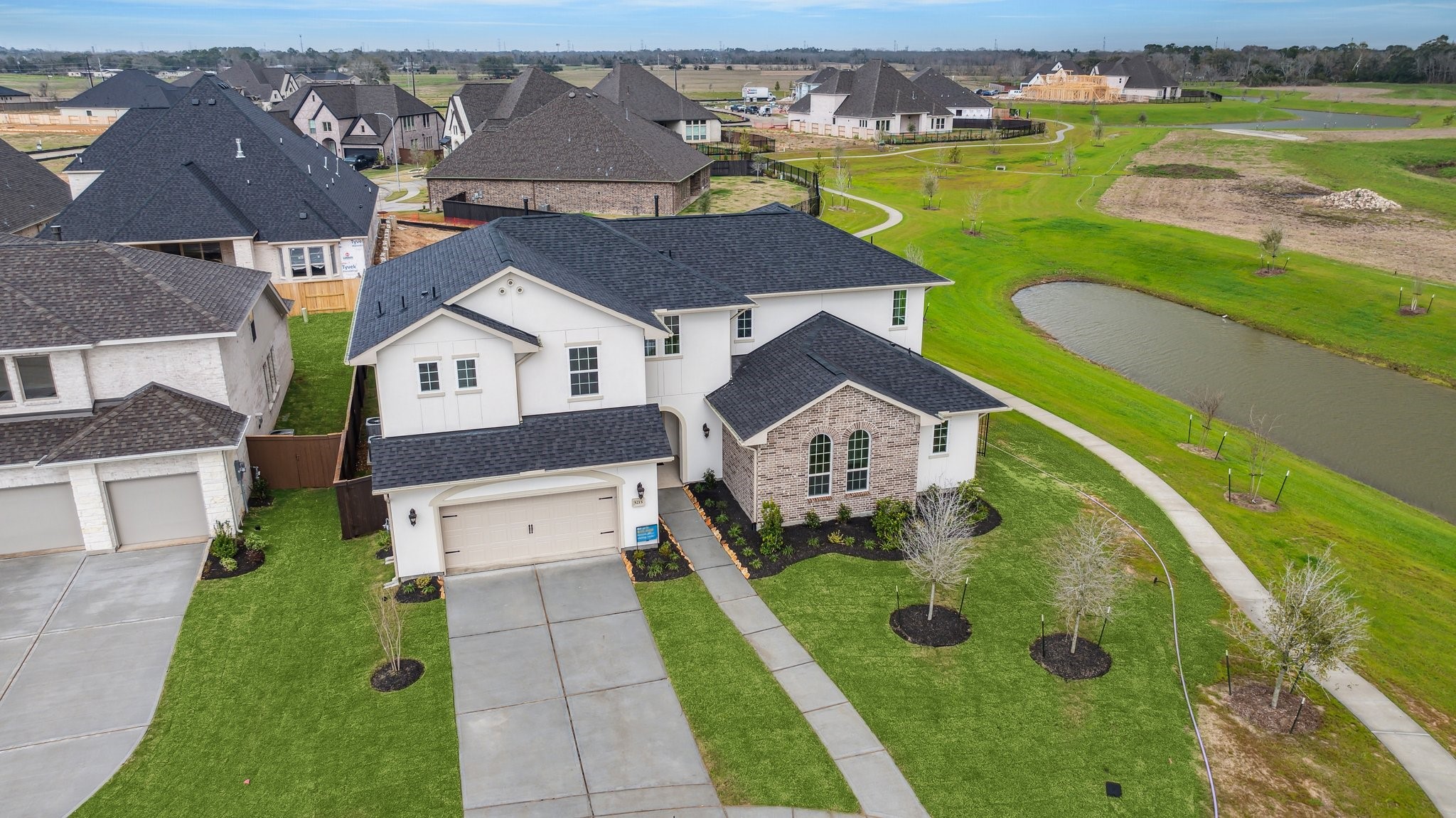 5215 Conifer Court Manvel, TX 77578 - Photo 48 of 49 an aerial view of a house with a garden