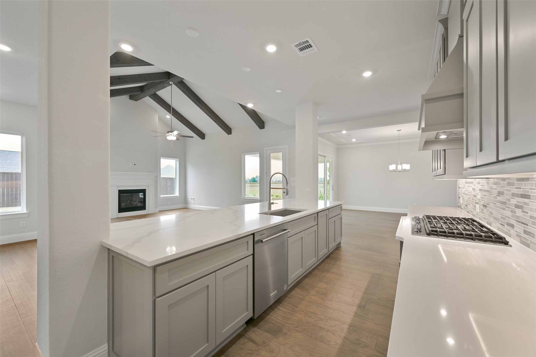 5215 Conifer Court Manvel, TX 77578 - Photo 10 of 49 a large white kitchen with a large window