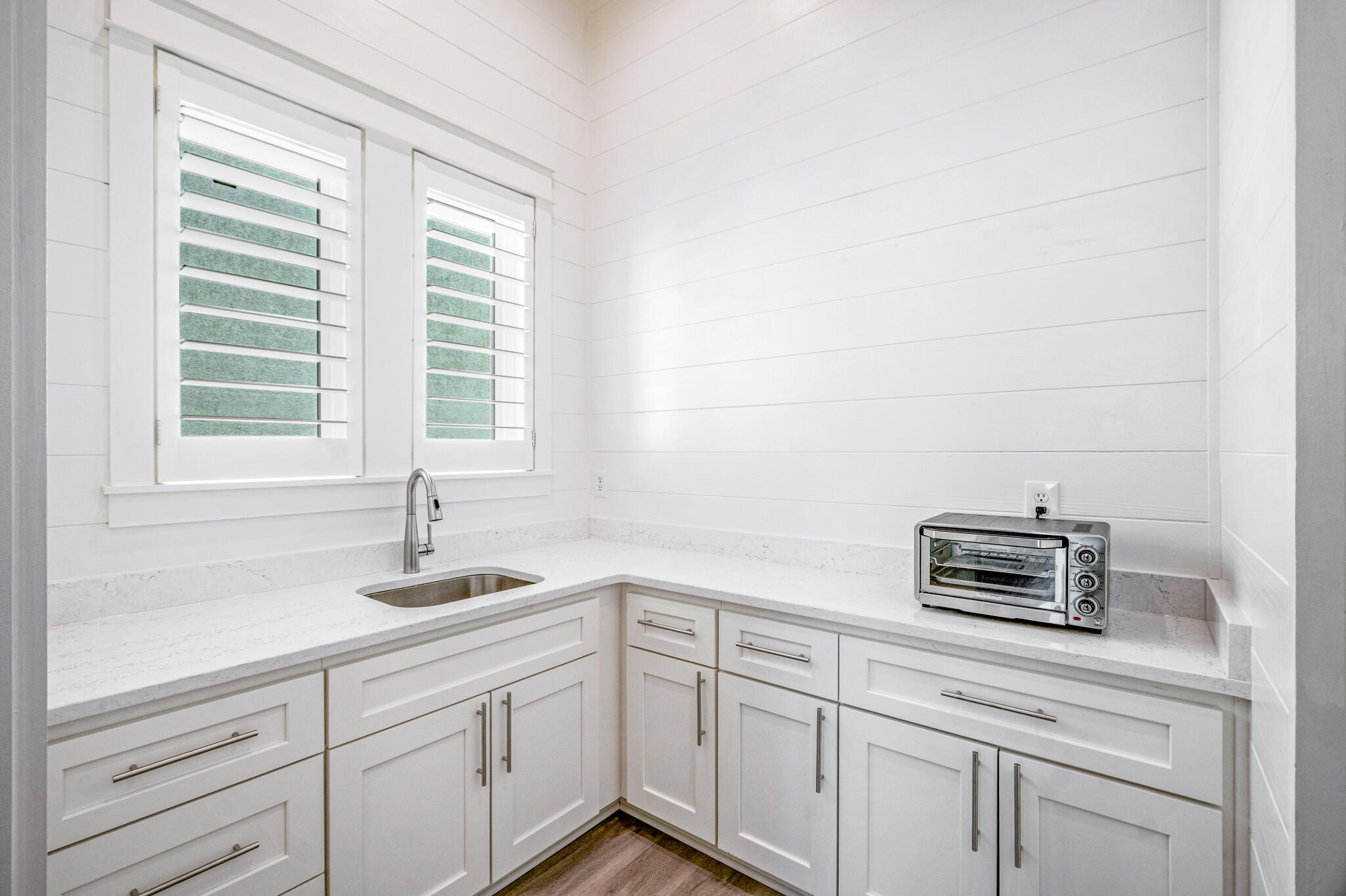 40 Cote D Azur Drive Santa Rosa Beach, FL 32459 - Photo 14 of 92 a kitchen with a sink and cabinets