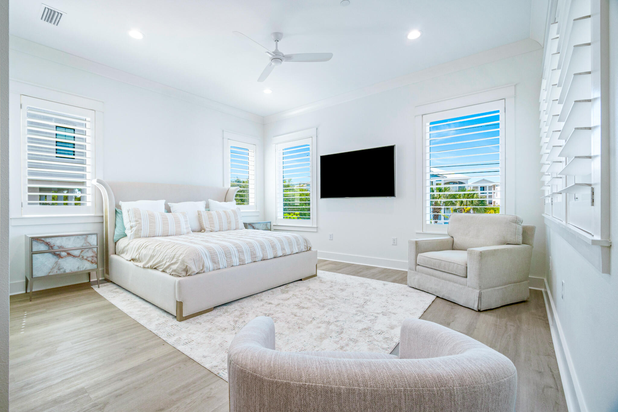 40 Cote D Azur Drive Santa Rosa Beach, FL 32459 - Photo 28 of 92 a living room with furniture and a flat screen tv