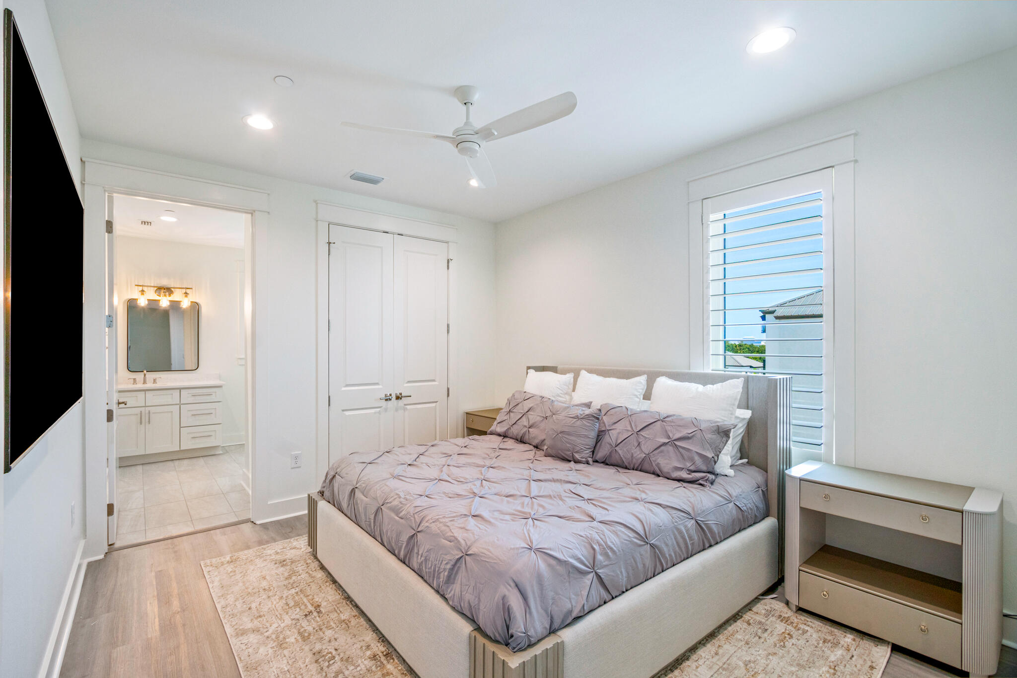 40 Cote D Azur Drive Santa Rosa Beach, FL 32459 - Photo 48 of 92 a spacious bedroom with a bed and a view of bathroom