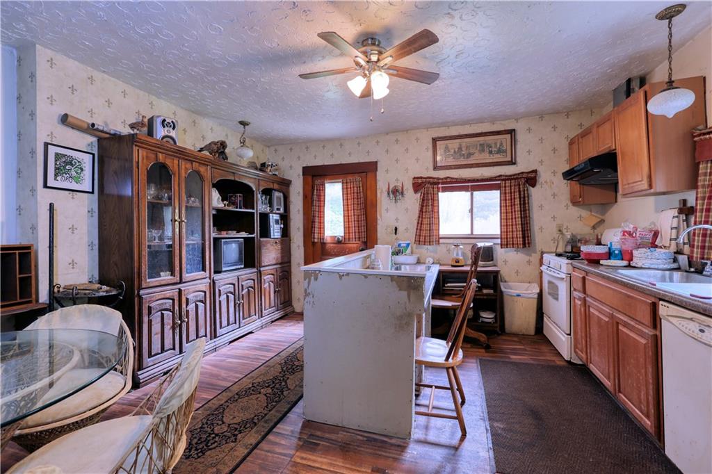 1210 Sharon Road Beaver, PA 15009 - Photo 3 of 18 a view of a dining room with furniture and chandelier