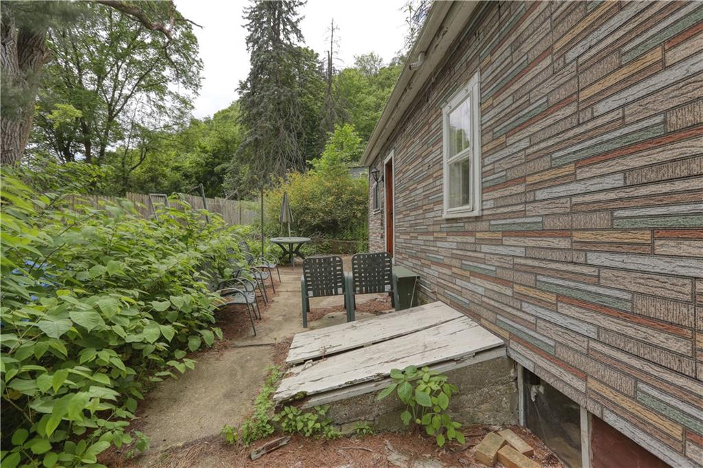 1210 Sharon Road Beaver, PA 15009 - Photo 7 of 18 a backyard of a house with outdoor seating