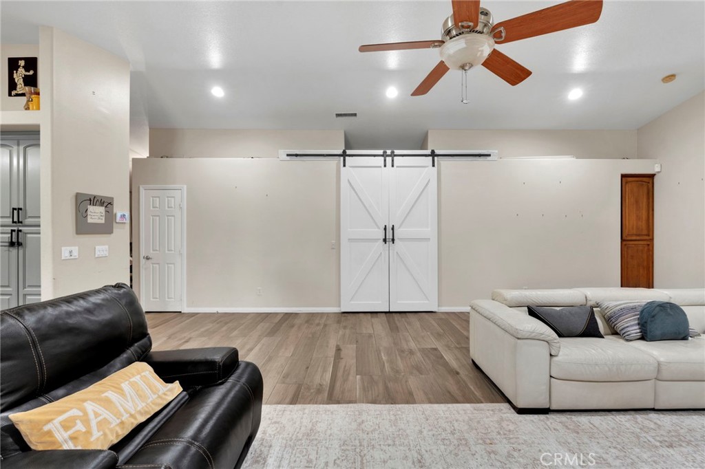 17777 Brazier Drive Riverside, CA 92508 - Photo 19 of 55 a living room with furniture and a ceiling fan