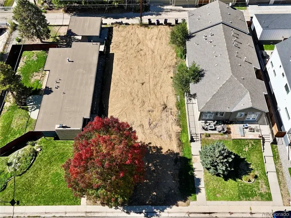 an aerial view of residential house with outdoor space