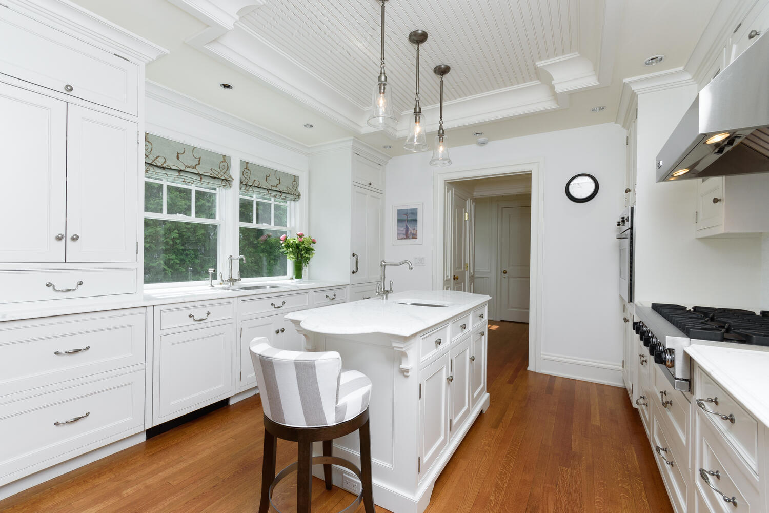 59 5 Mile River Road Darien, CT 06820 - Photo 16 of 39 a kitchen with a sink stove and cabinets