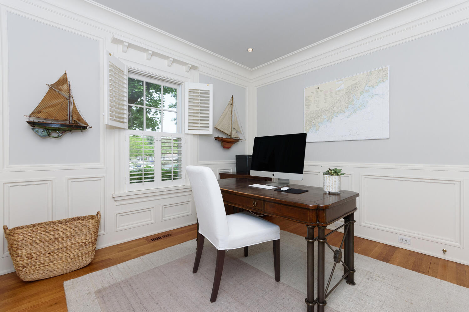 59 5 Mile River Road Darien, CT 06820 - Photo 18 of 39 a view of a workspace with furniture and a window