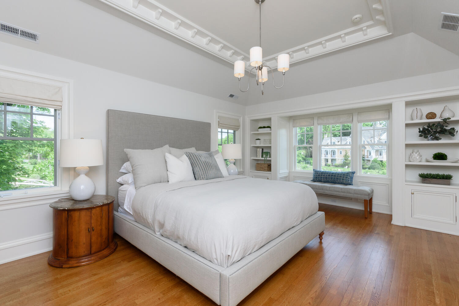 59 5 Mile River Road Darien, CT 06820 - Photo 20 of 39 a large bed sitting in a spacious bedroom next to a window