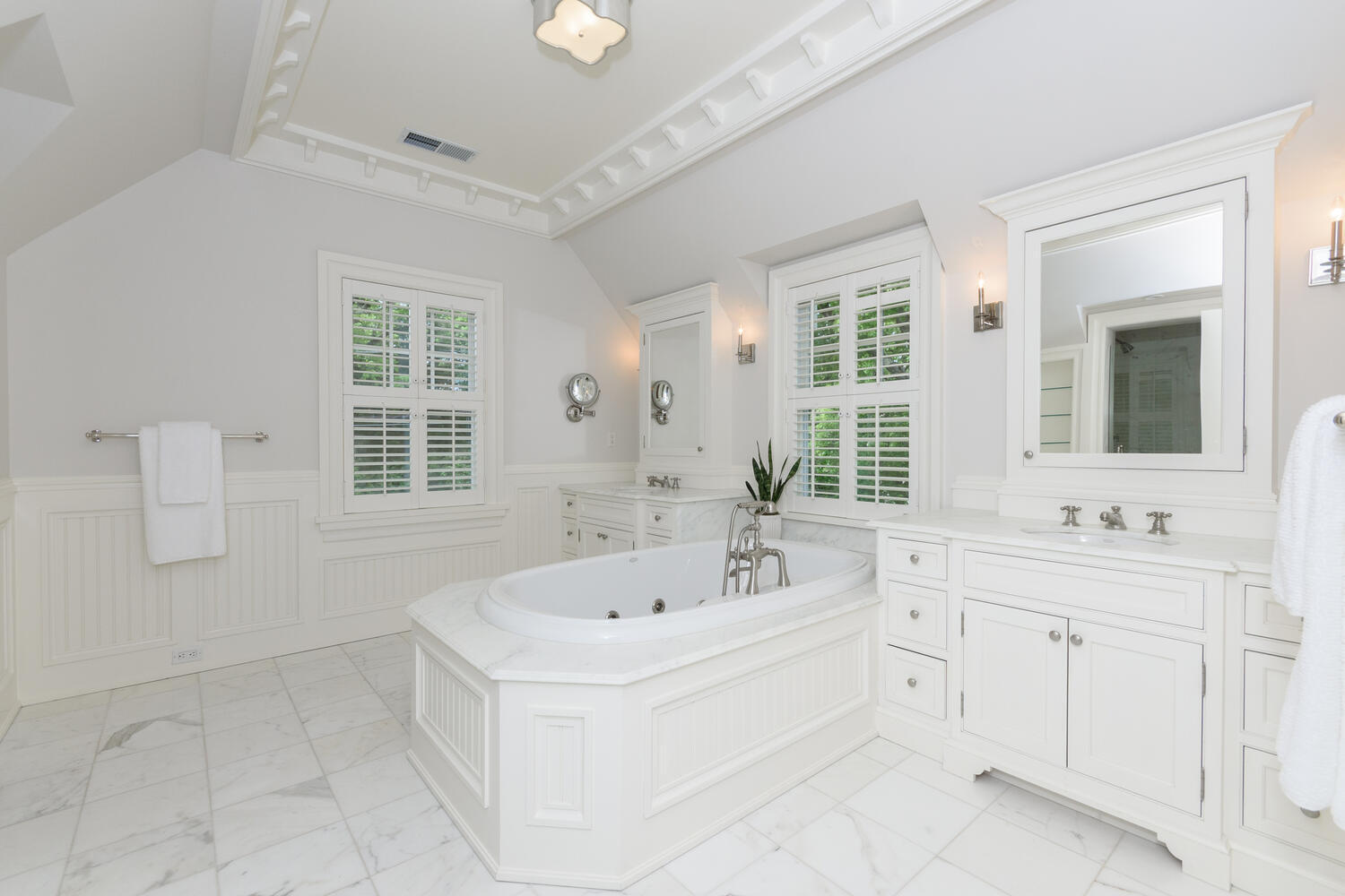 59 5 Mile River Road Darien, CT 06820 - Photo 22 of 39 a spacious bathroom with sink shower and mirror