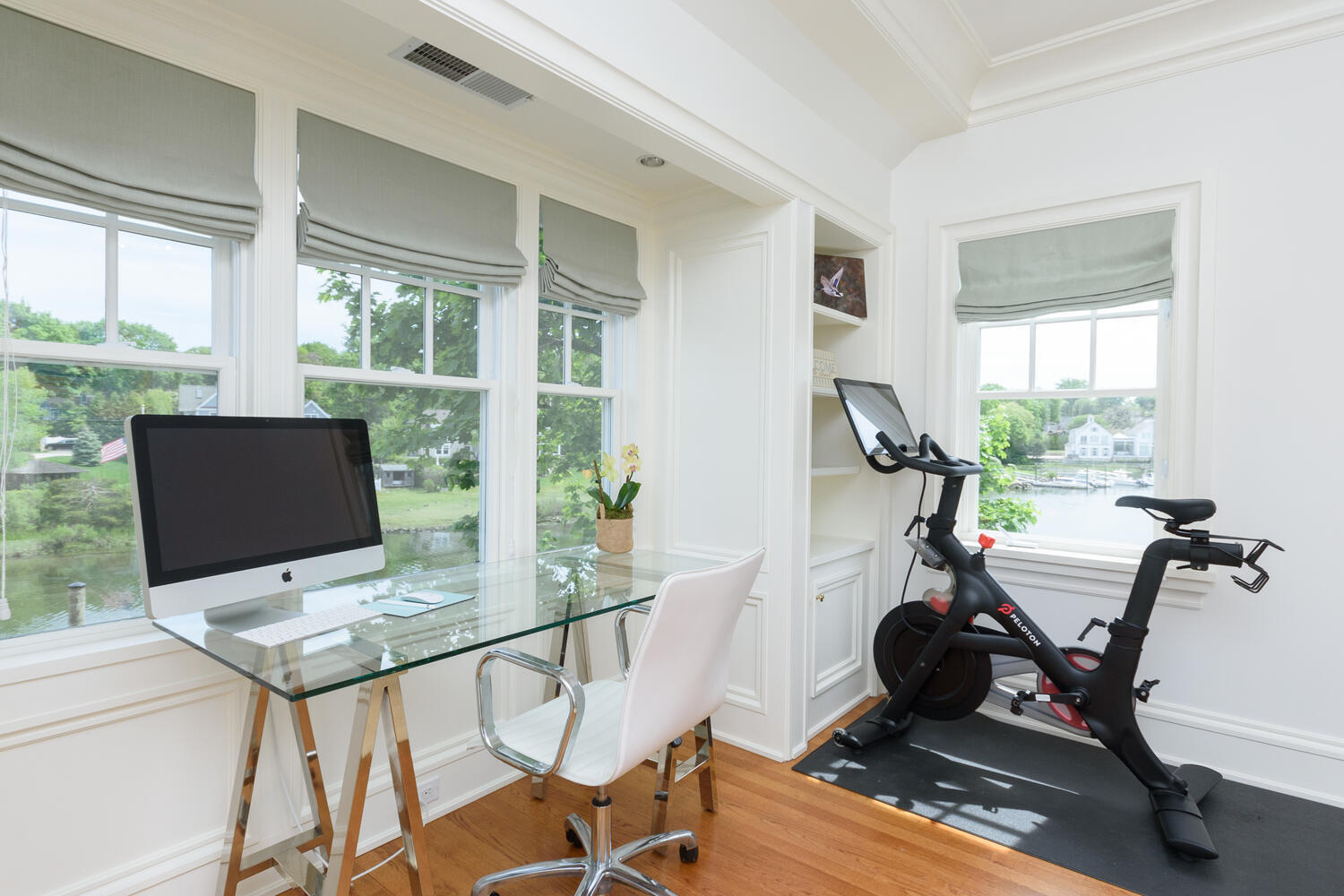 59 5 Mile River Road Darien, CT 06820 - Photo 24 of 39 a view of a workspace with furniture and a window