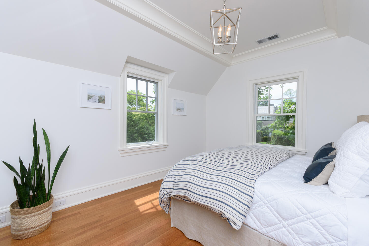 59 5 Mile River Road Darien, CT 06820 - Photo 26 of 39 a bedroom with bed and a window