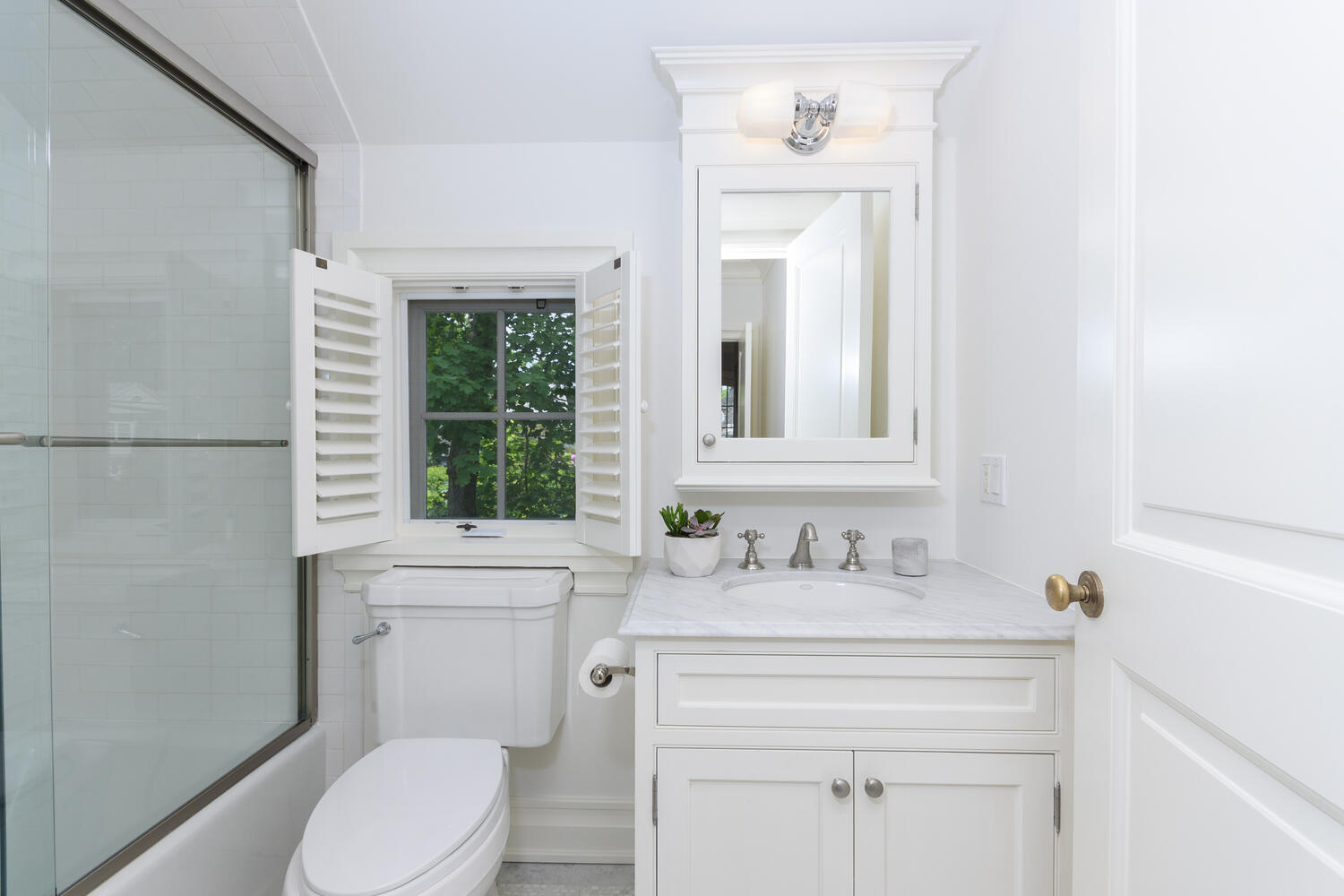 59 5 Mile River Road Darien, CT 06820 - Photo 27 of 39 a bathroom with a toilet sink and mirror