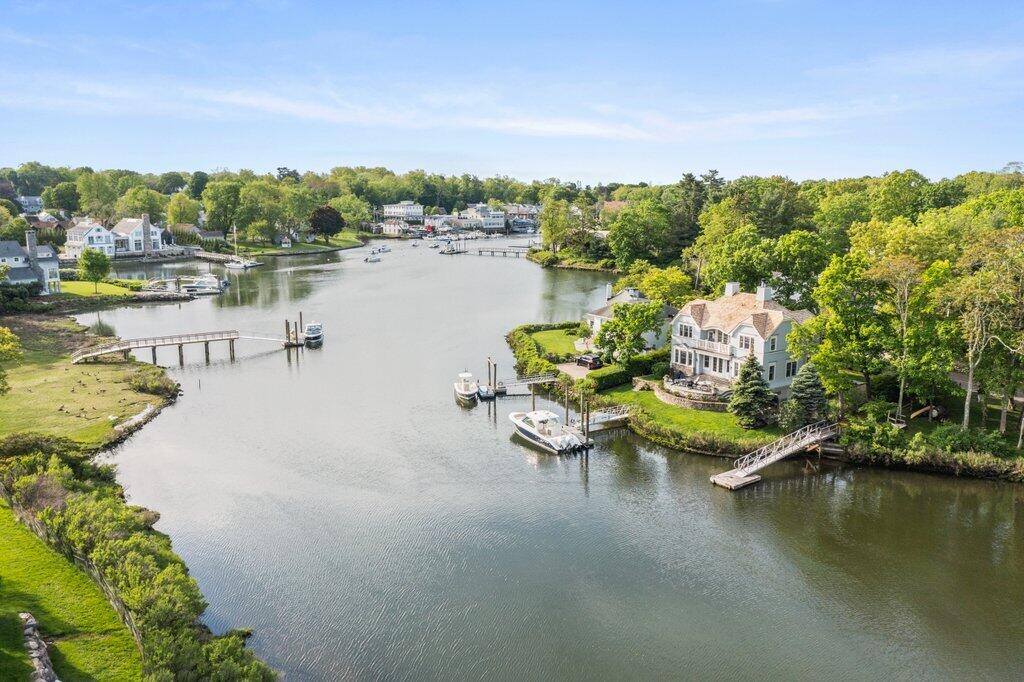59 5 Mile River Road Darien, CT 06820 - Photo 35 of 39 a view of a lake with a mountain view