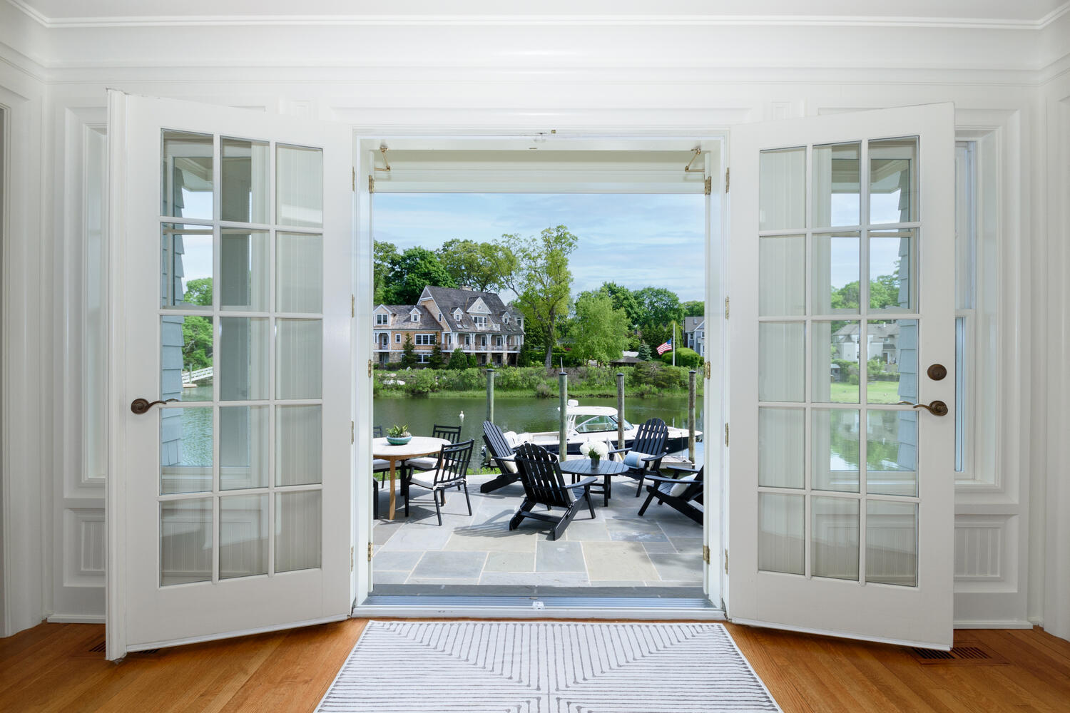 59 5 Mile River Road Darien, CT 06820 - Photo 8 of 39 a view of living room with furniture and garden view