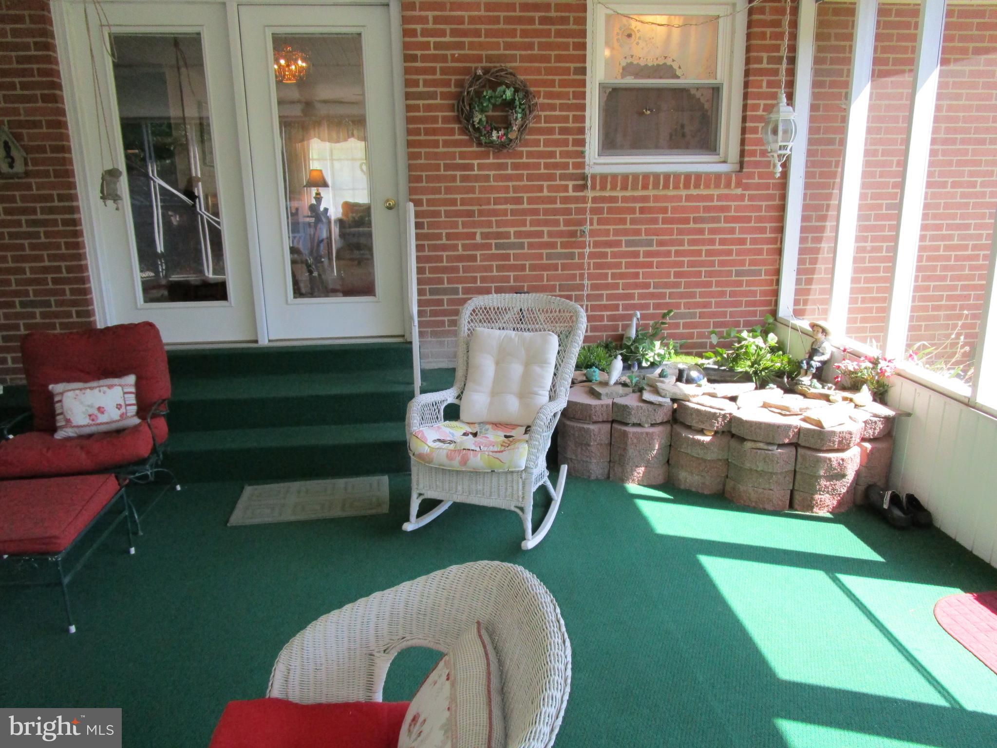 4166 Carrs Ridge Road Edgewater, MD 21037 - Photo 12 of 30 Porch with Fish Pond