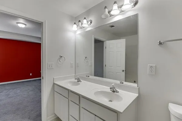 a view of a house with backyard and porch