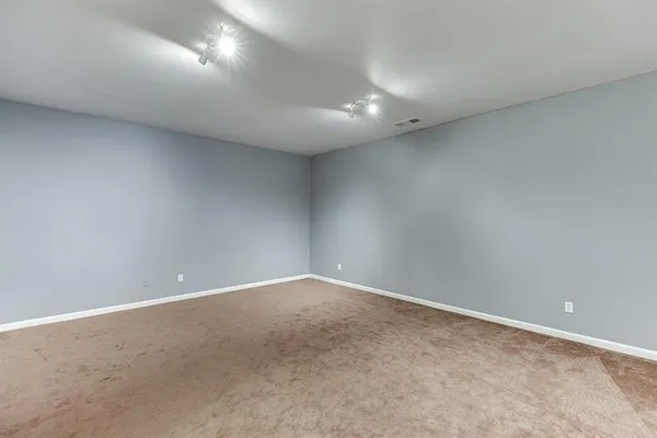 an empty room with a natural light