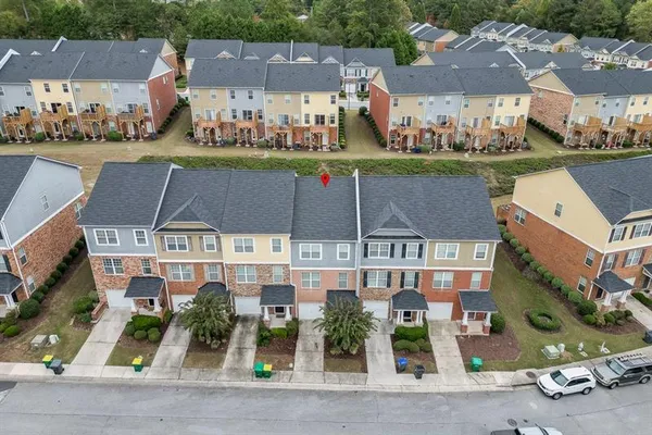 a view of a building with outdoor space and a lake view