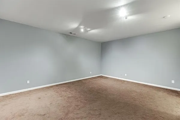an empty room with a natural light