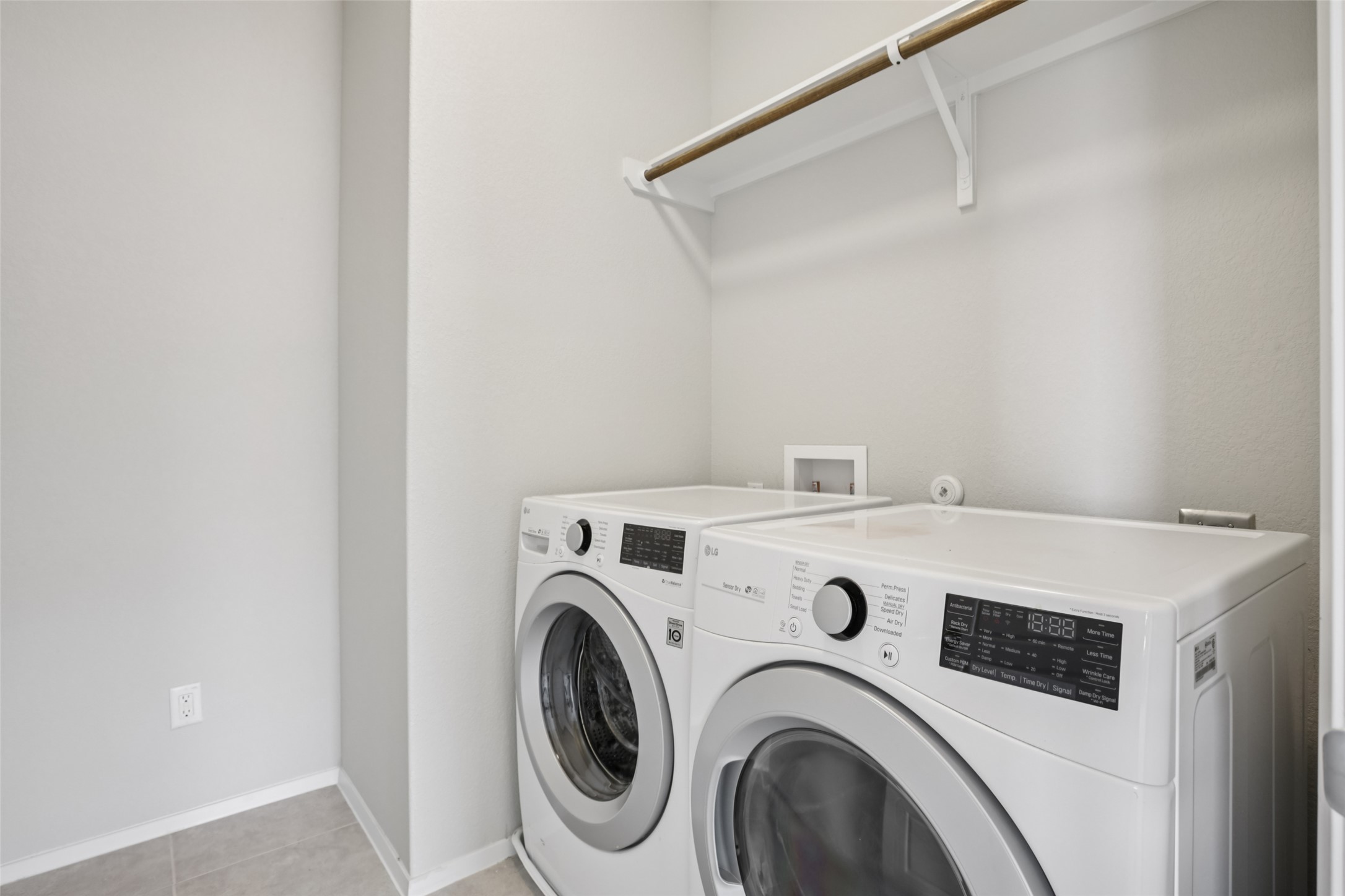293 Gaida Loop Georgetown, TX 78628 - Photo 18 of 39 a utility room with dryer and washer