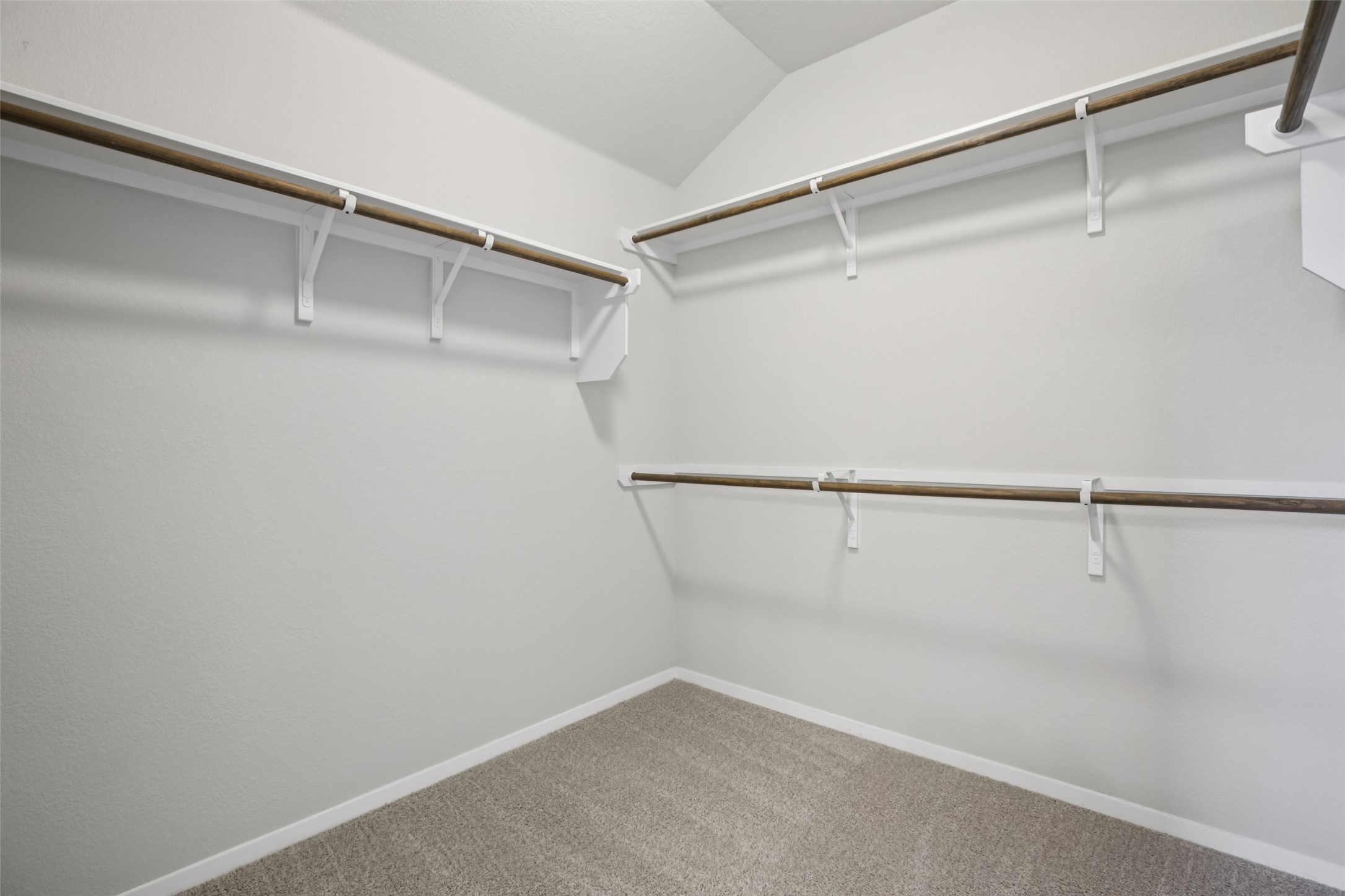 293 Gaida Loop Georgetown, TX 78628 - Photo 20 of 39 a view of a room with racks on the wall