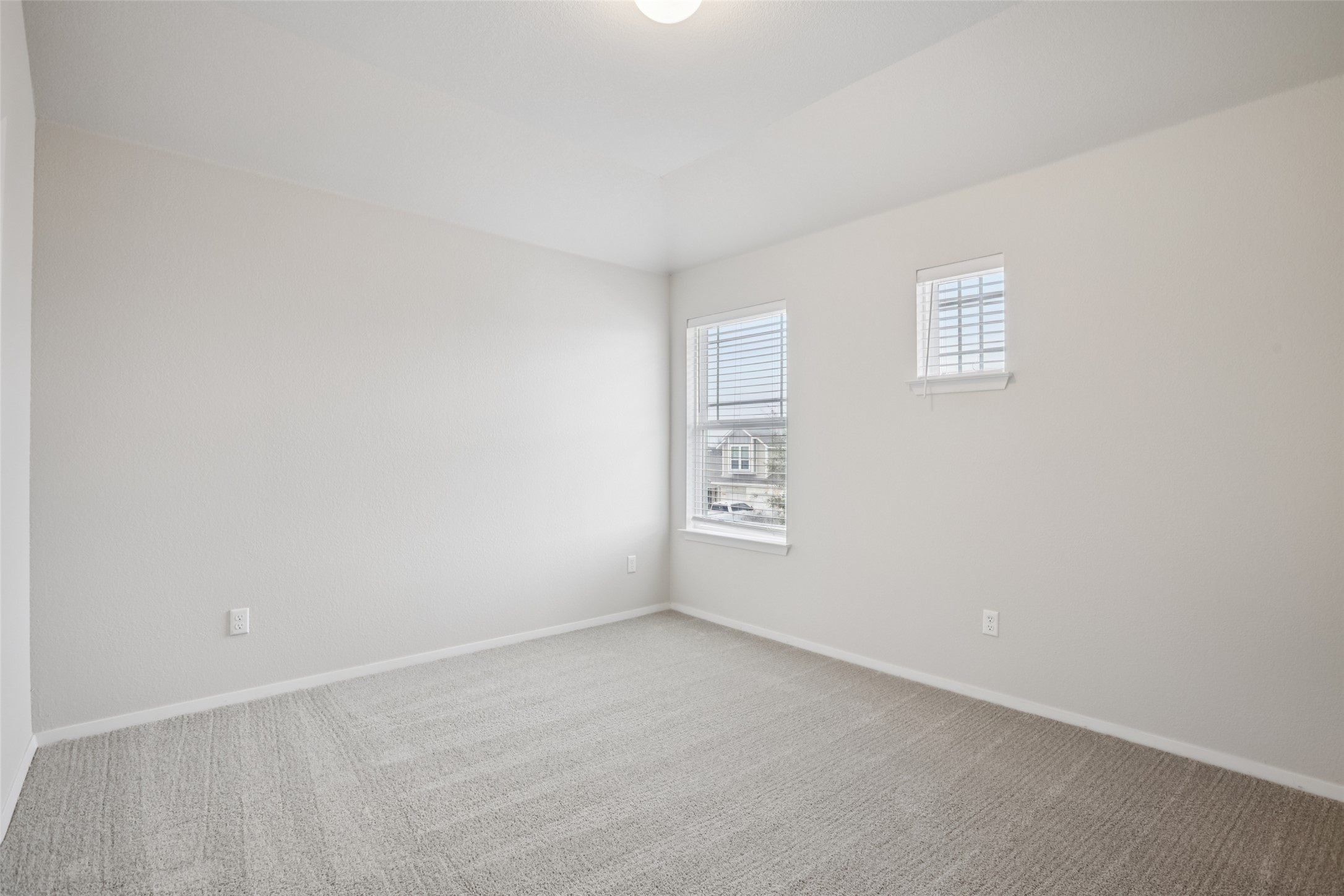 293 Gaida Loop Georgetown, TX 78628 - Photo 30 of 39 an empty room with windows
