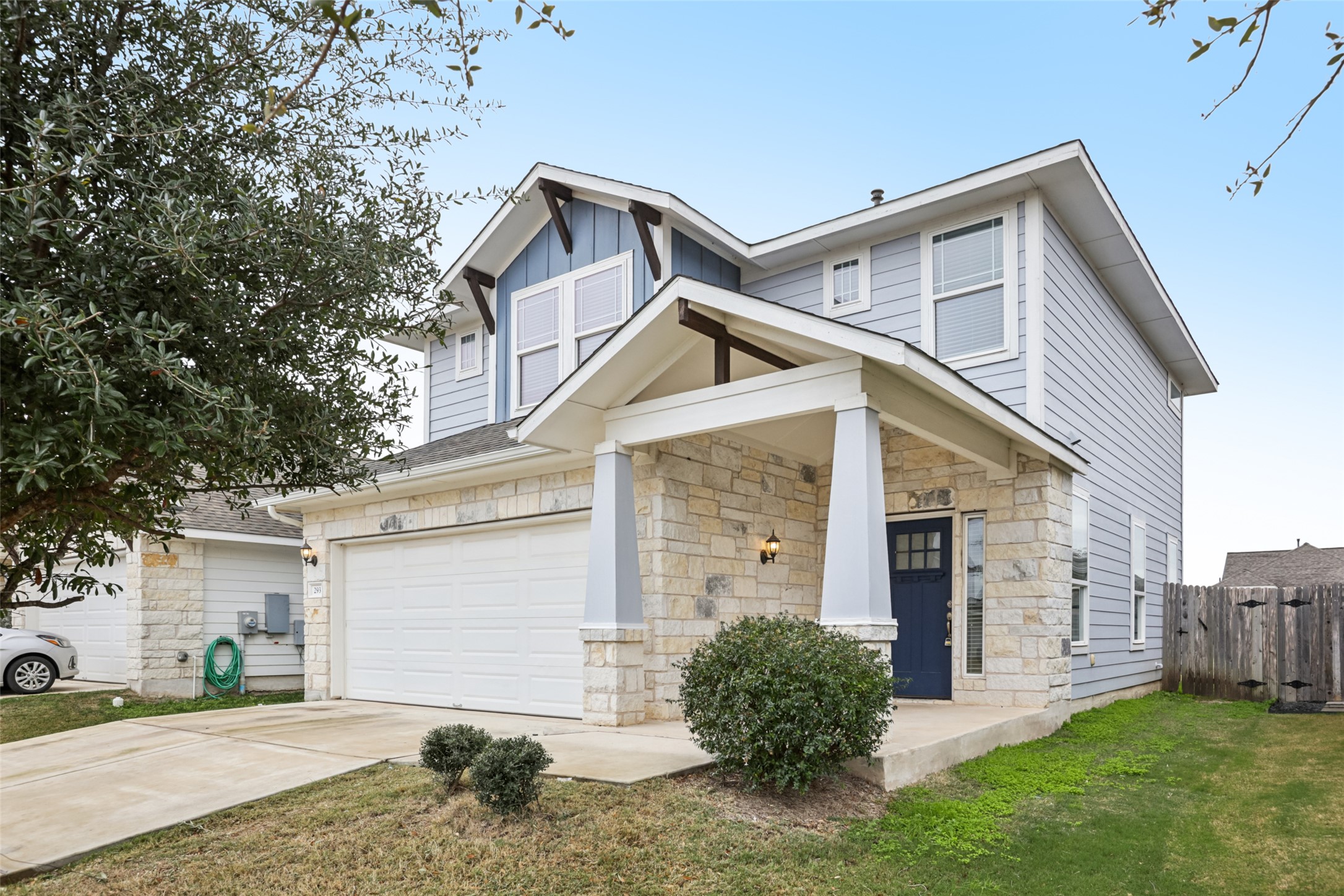 293 Gaida Loop Georgetown, TX 78628 - Photo 33 of 39 a view of a house with a yard and large tree