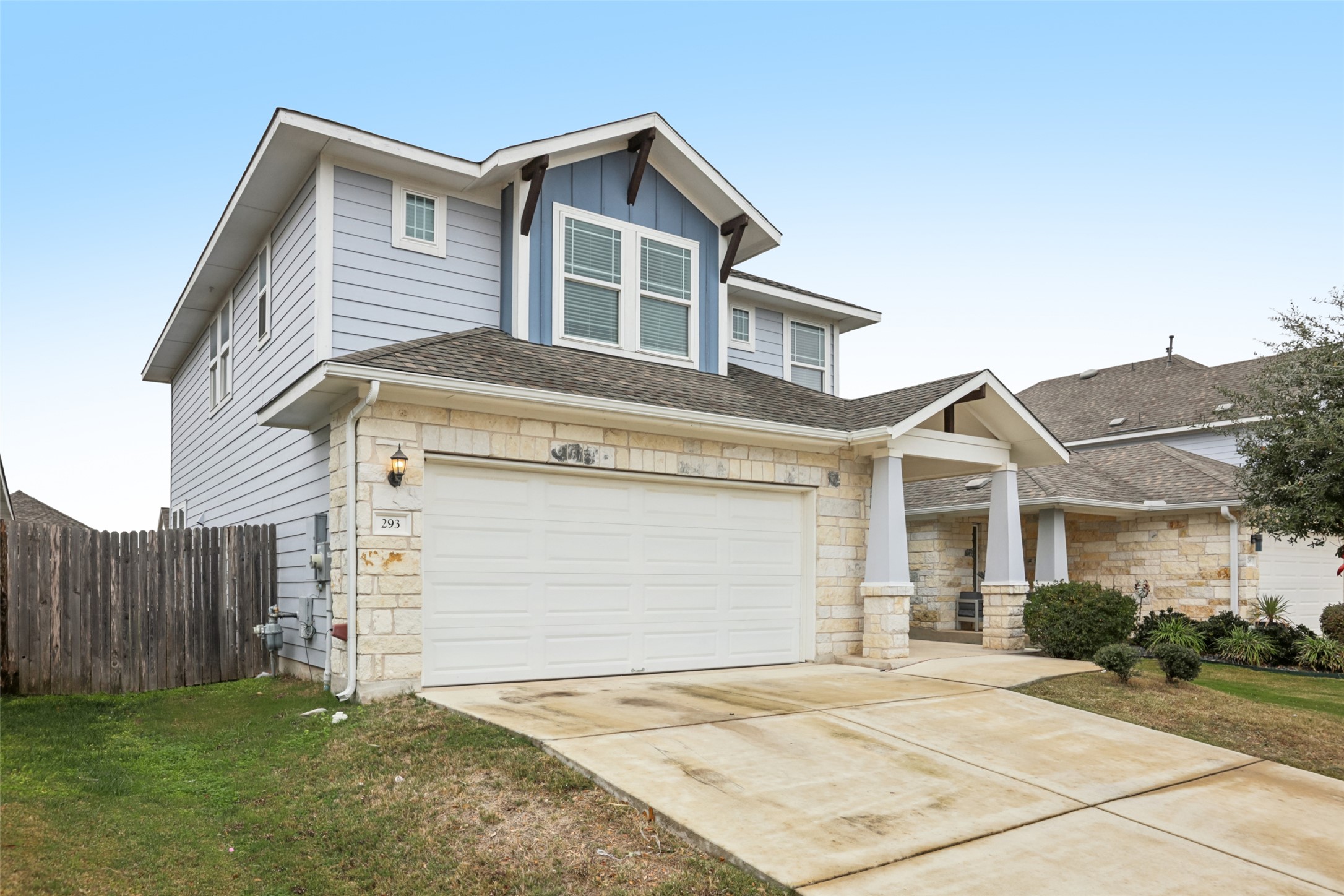 293 Gaida Loop Georgetown, TX 78628 - Photo 34 of 39 a view of a house with a yard and garage