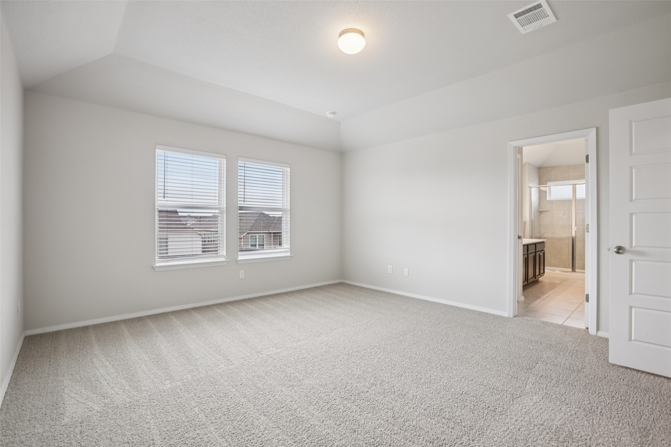 293 Gaida Loop Georgetown, TX 78628 - Photo 4 of 39 an empty room with windows and closet