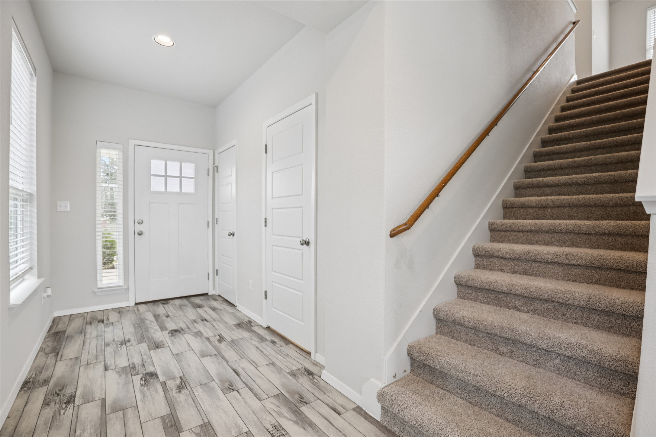 293 Gaida Loop Georgetown, TX 78628 - Photo 10 of 39 a view of an entryway with wooden floor