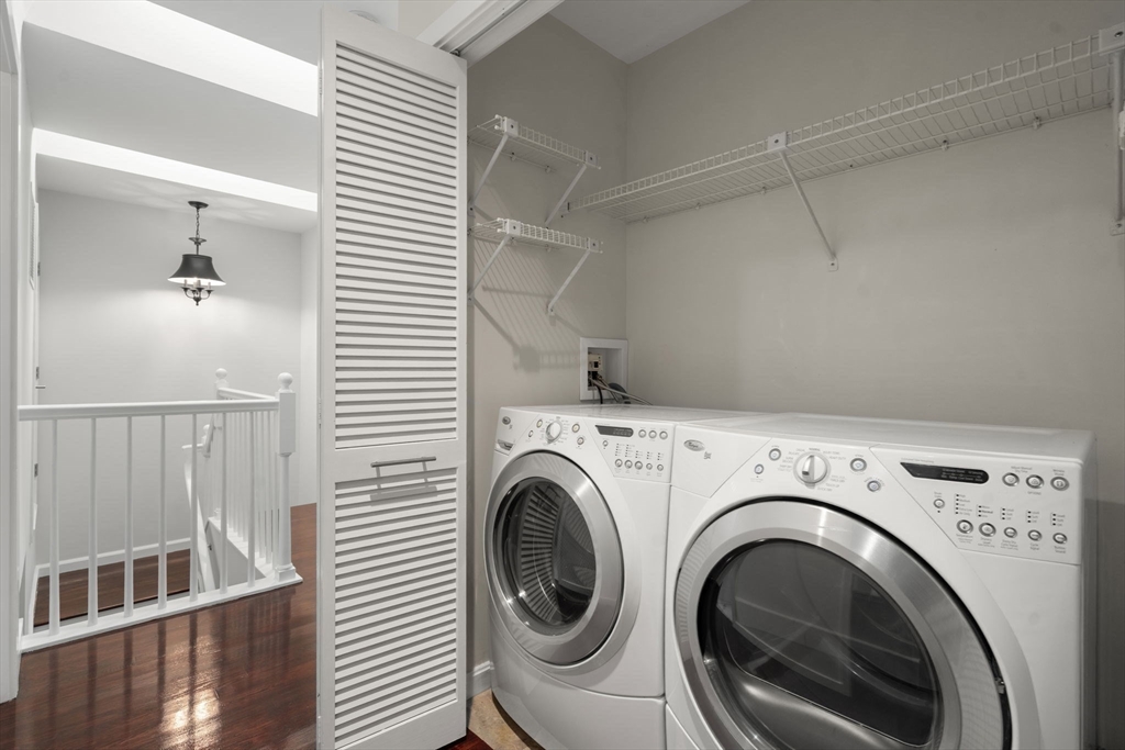 553 Boylston Street, Unit C2 Brookline, MA 02445 - Photo 22 of 31 a utility room with dryer and washer
