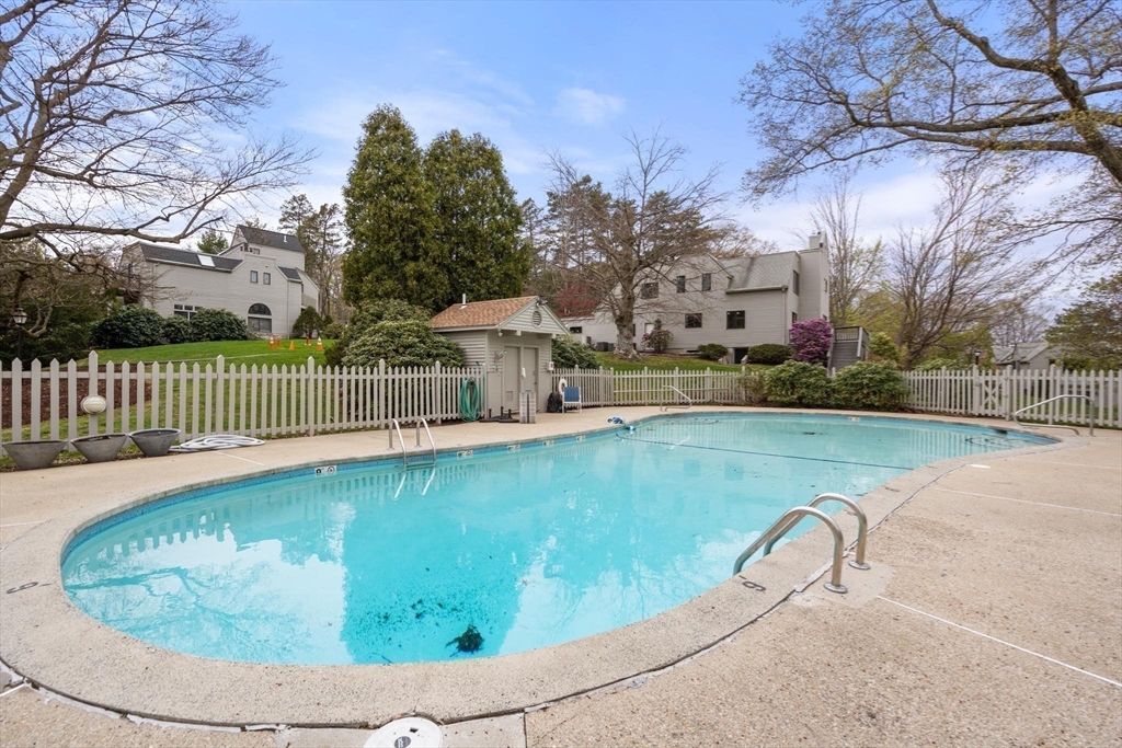 553 Boylston Street, Unit C2 Brookline, MA 02445 - Photo 28 of 31 a view of a swimming pool with a porch and a yard