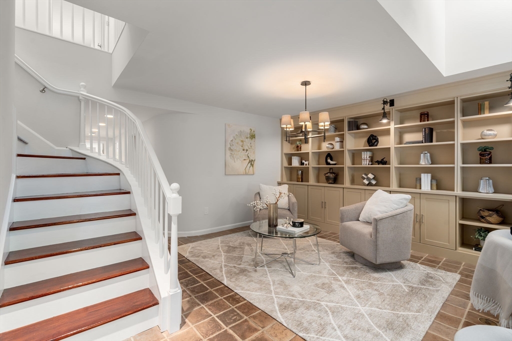 553 Boylston Street, Unit C2 Brookline, MA 02445 - Photo 5 of 31 a living room with furniture and white walls
