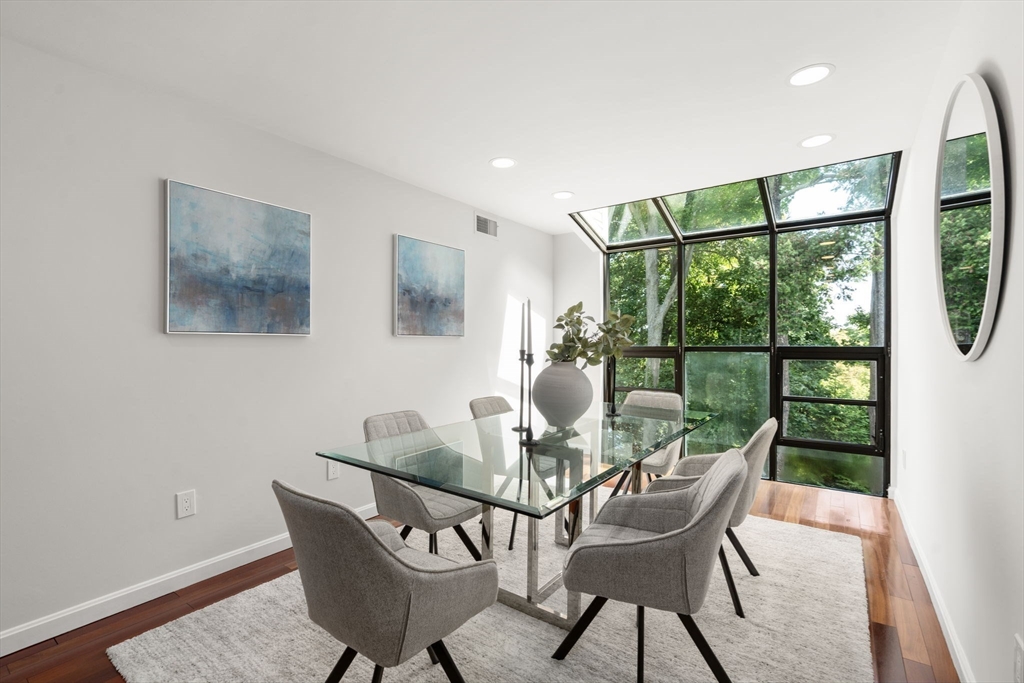 553 Boylston Street, Unit C2 Brookline, MA 02445 - Photo 10 of 31 a dining room with furniture and wooden floor