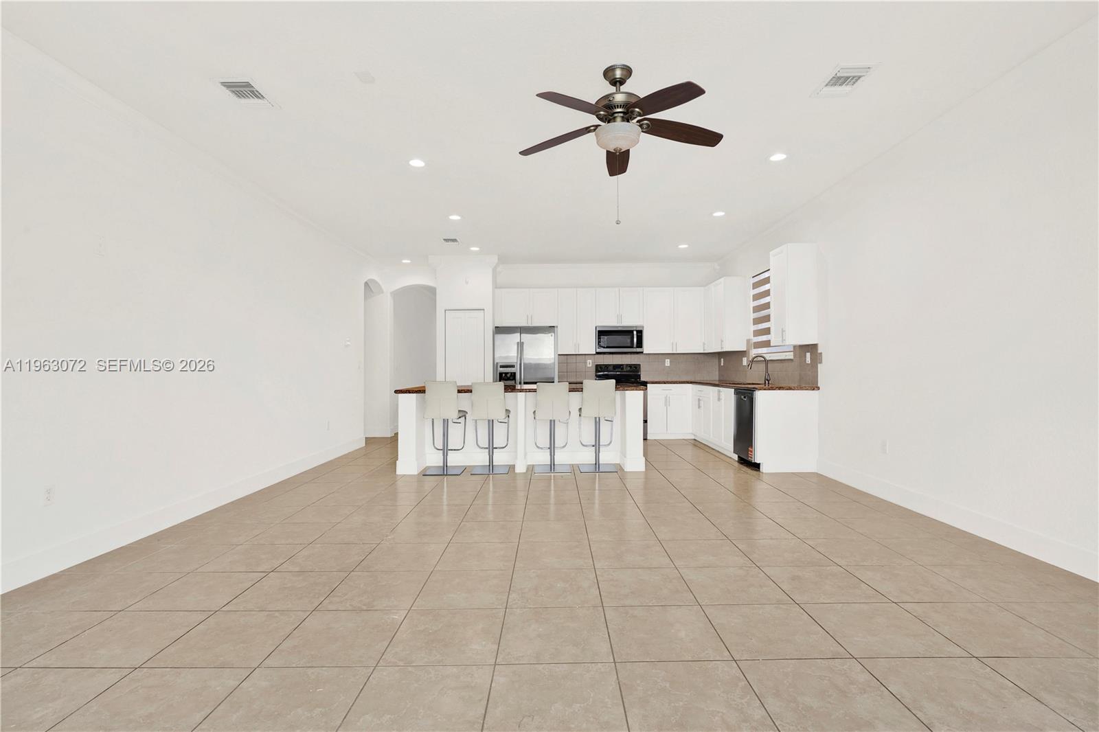23824 Southwest 107th Place Homestead, FL 33032 - Photo 14 of 33 a view of kitchen with furniture and window