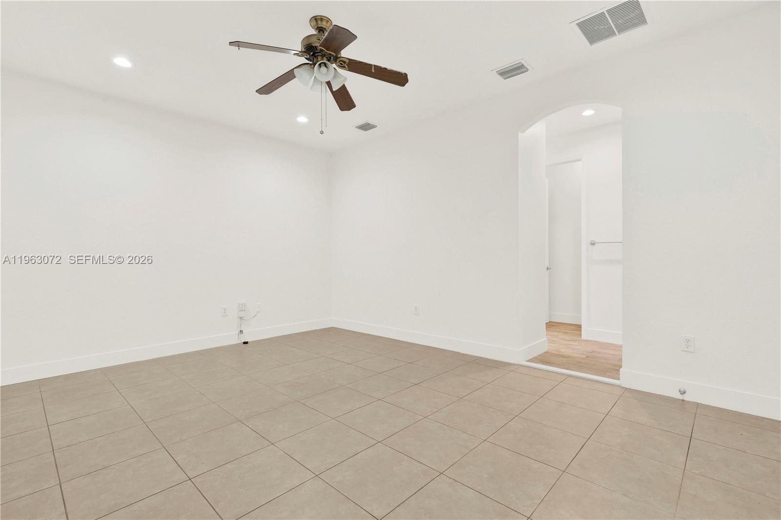 23824 Southwest 107th Place Homestead, FL 33032 - Photo 20 of 33 an empty room with closet and fan