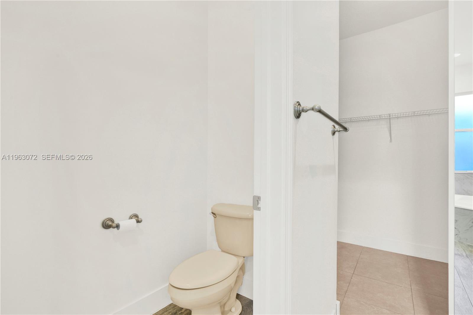 23824 Southwest 107th Place Homestead, FL 33032 - Photo 25 of 33 a white toilet sitting next to a shower