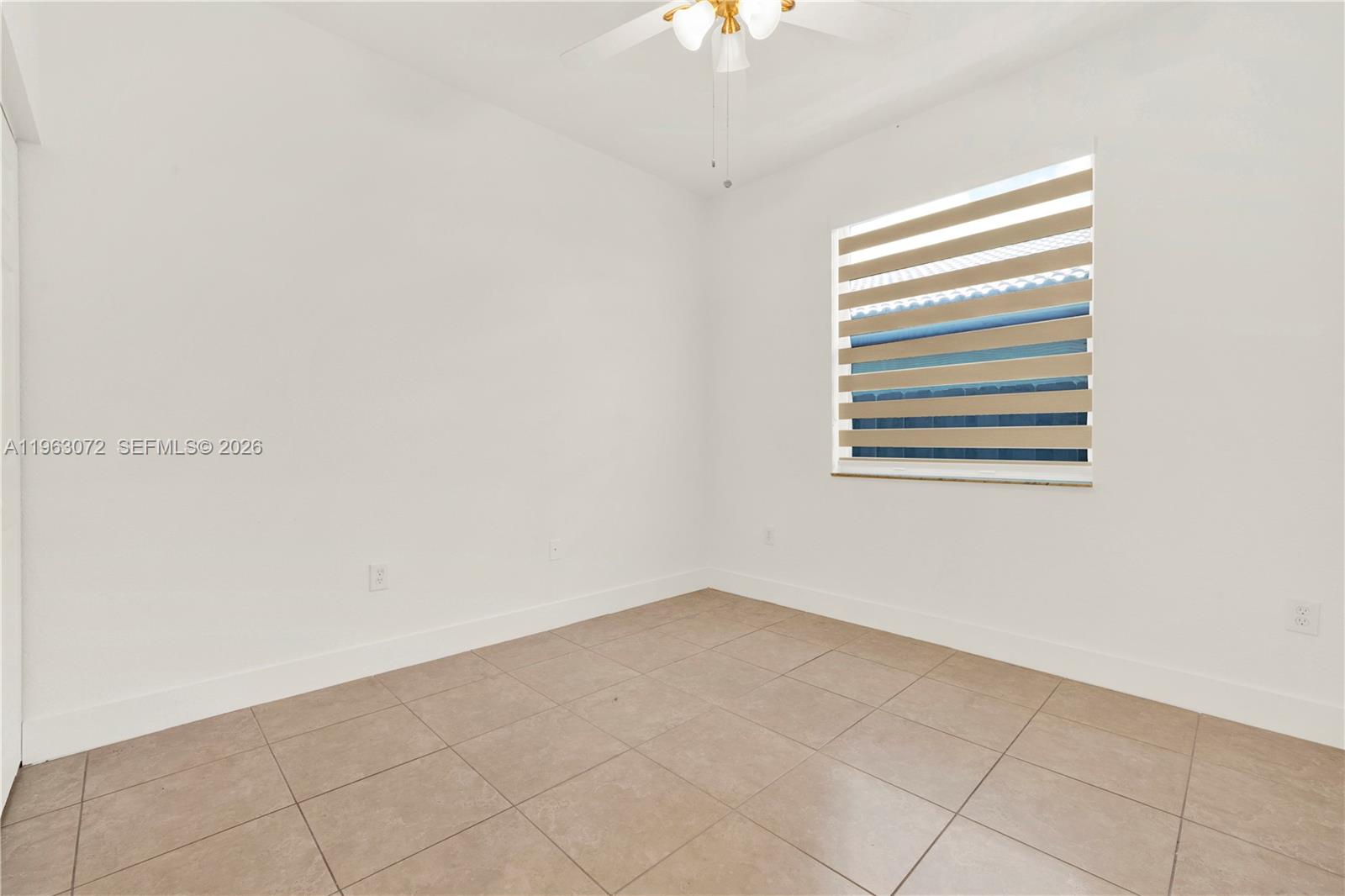 23824 Southwest 107th Place Homestead, FL 33032 - Photo 29 of 33 a view of a window in a room
