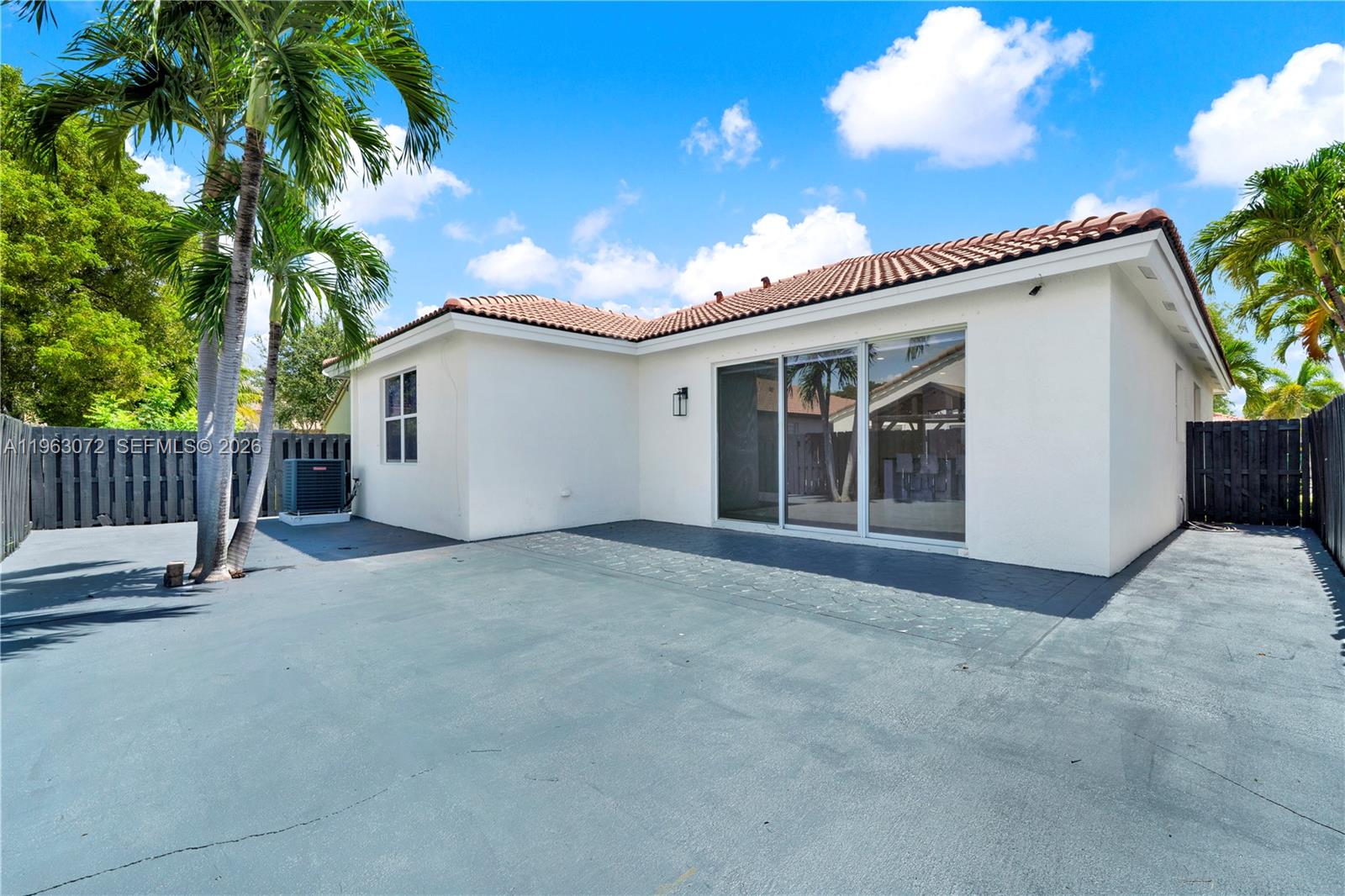 23824 Southwest 107th Place Homestead, FL 33032 - Photo 5 of 33 a view of house with a outdoor space and shower