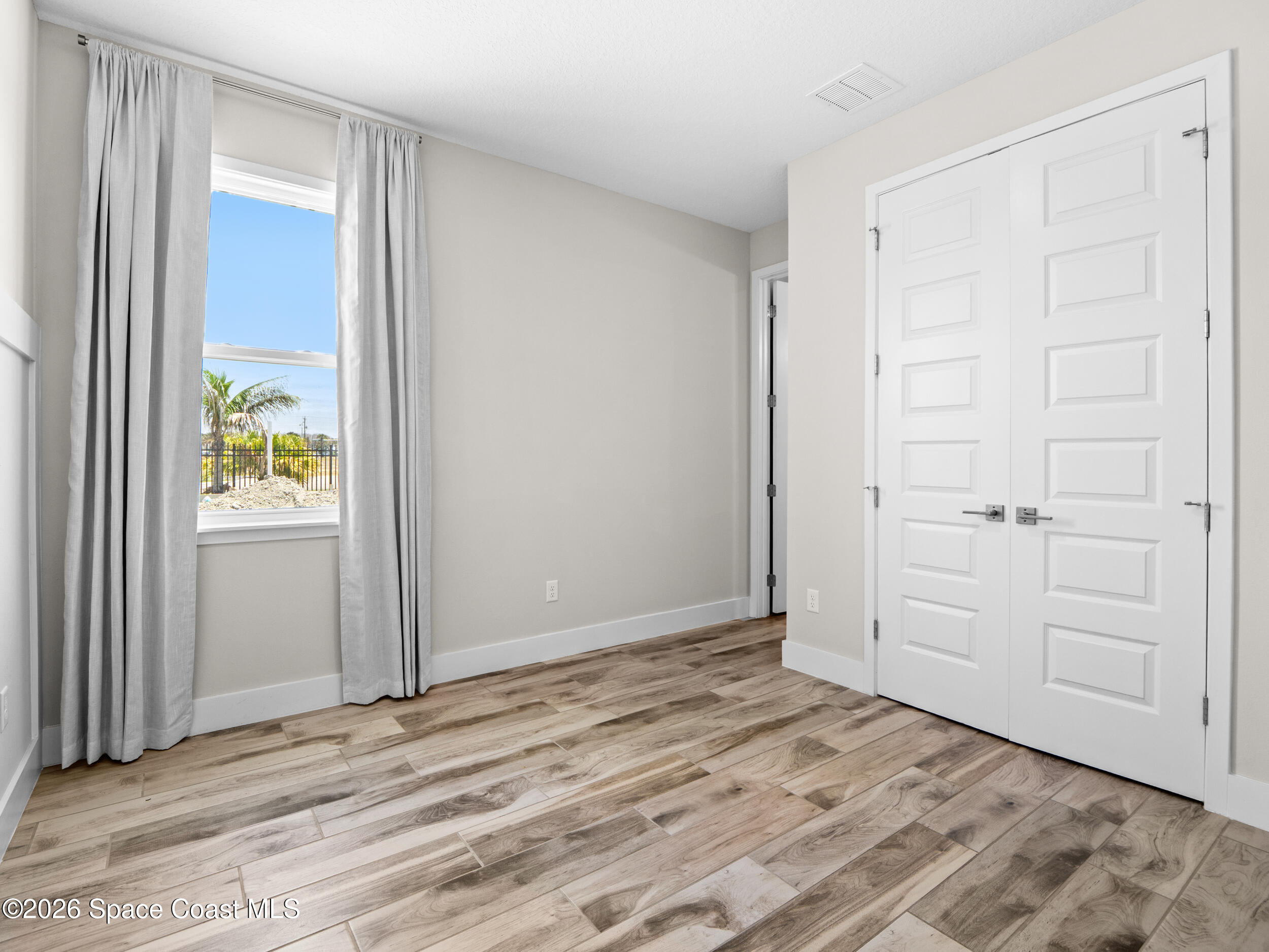 27 Gulfstream Way Satellite Beach, FL 32937 - Photo 19 of 26 an empty room with window