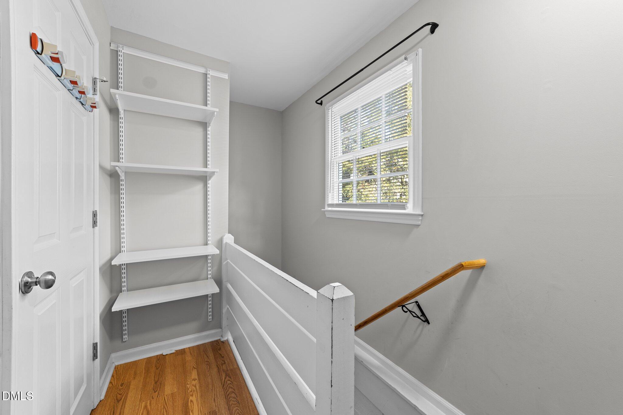 412 2nd Street Apex, NC 27502 - Photo 19 of 39 a view of walk in closet with empty racks