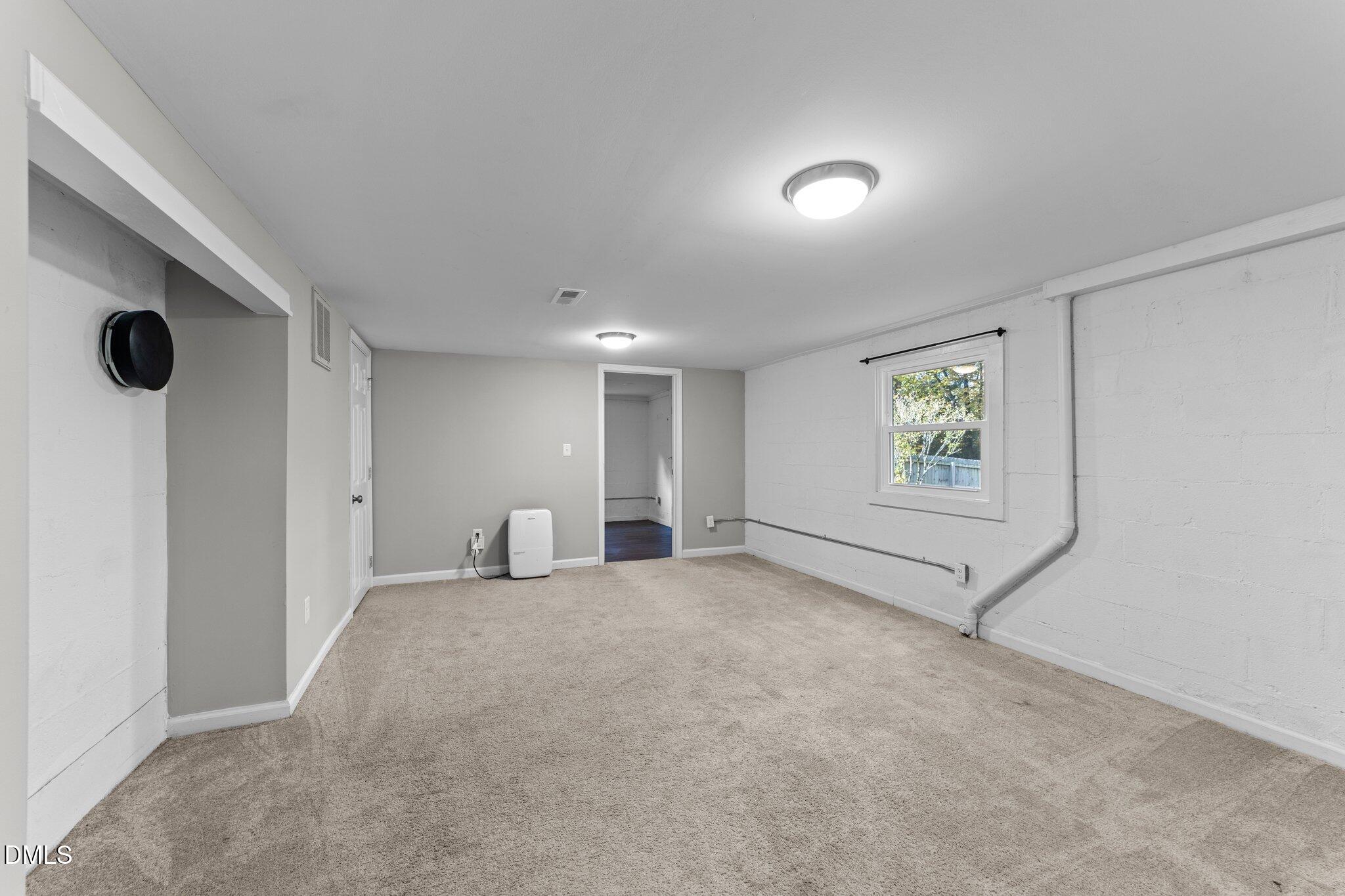 412 2nd Street Apex, NC 27502 - Photo 22 of 39 a view of a big room with windows and cabinet