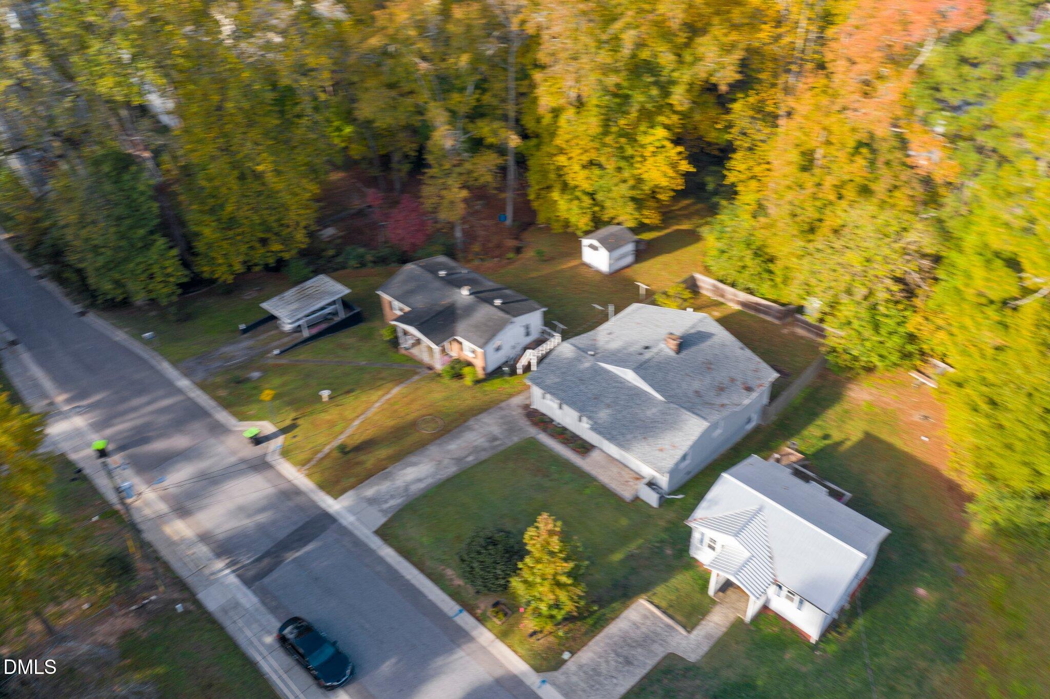 412 2nd Street Apex, NC 27502 - Photo 33 of 39 an aerial view of a house with a garden and swimming pool