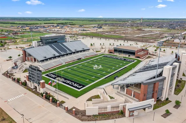 a view of a swimming pool and an outdoor space