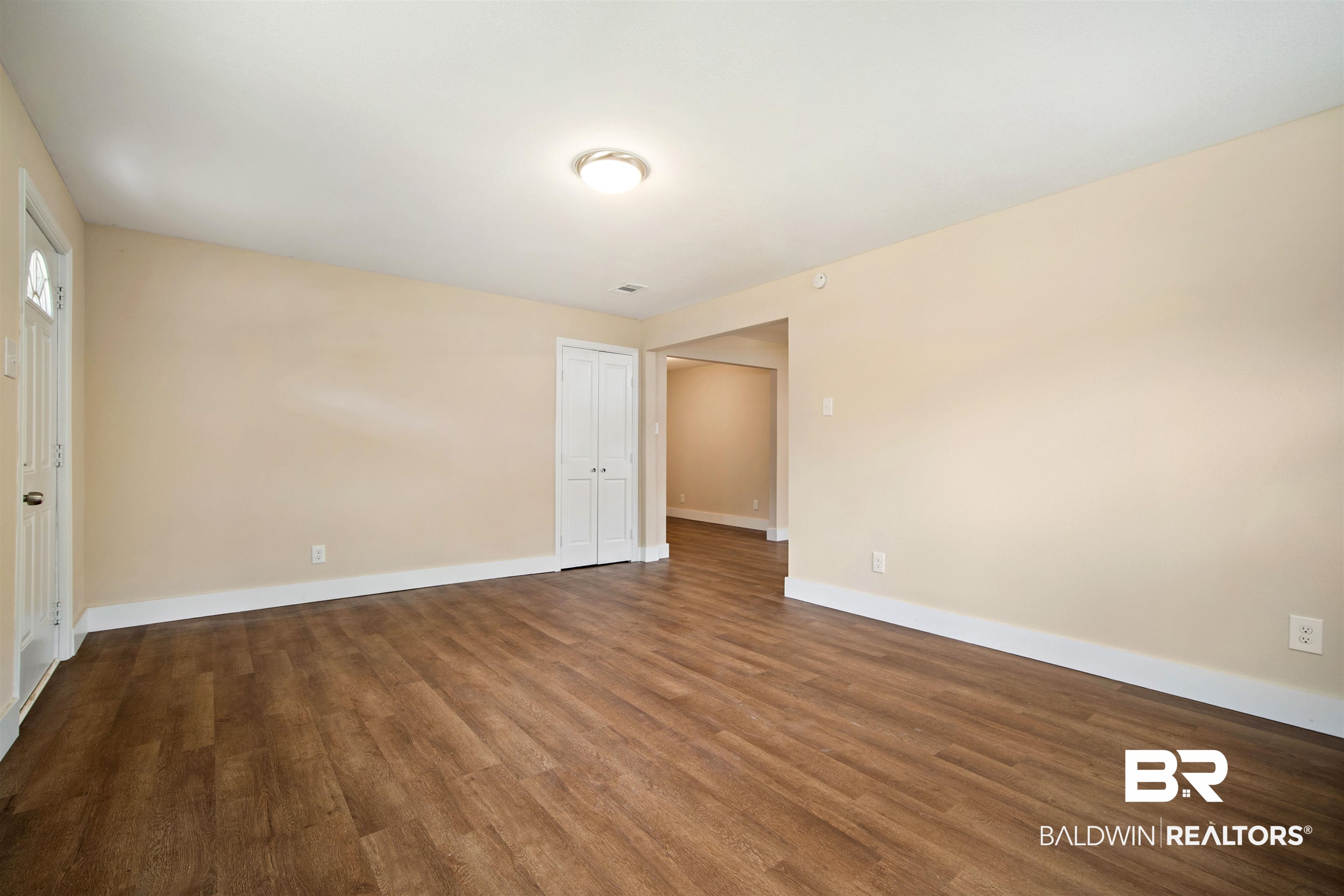 2119 Autrey Avenue Eight Mile, AL 36613 - Photo 6 of 22 Unfurnished room with hardwood / wood-style flooring