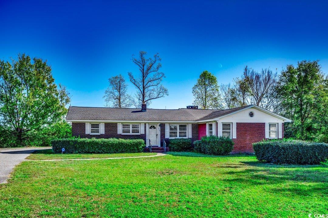 3701 South Green Sea Road Loris, SC 29569 - Photo 1 of 31 Ranch-style house featuring a front lawn